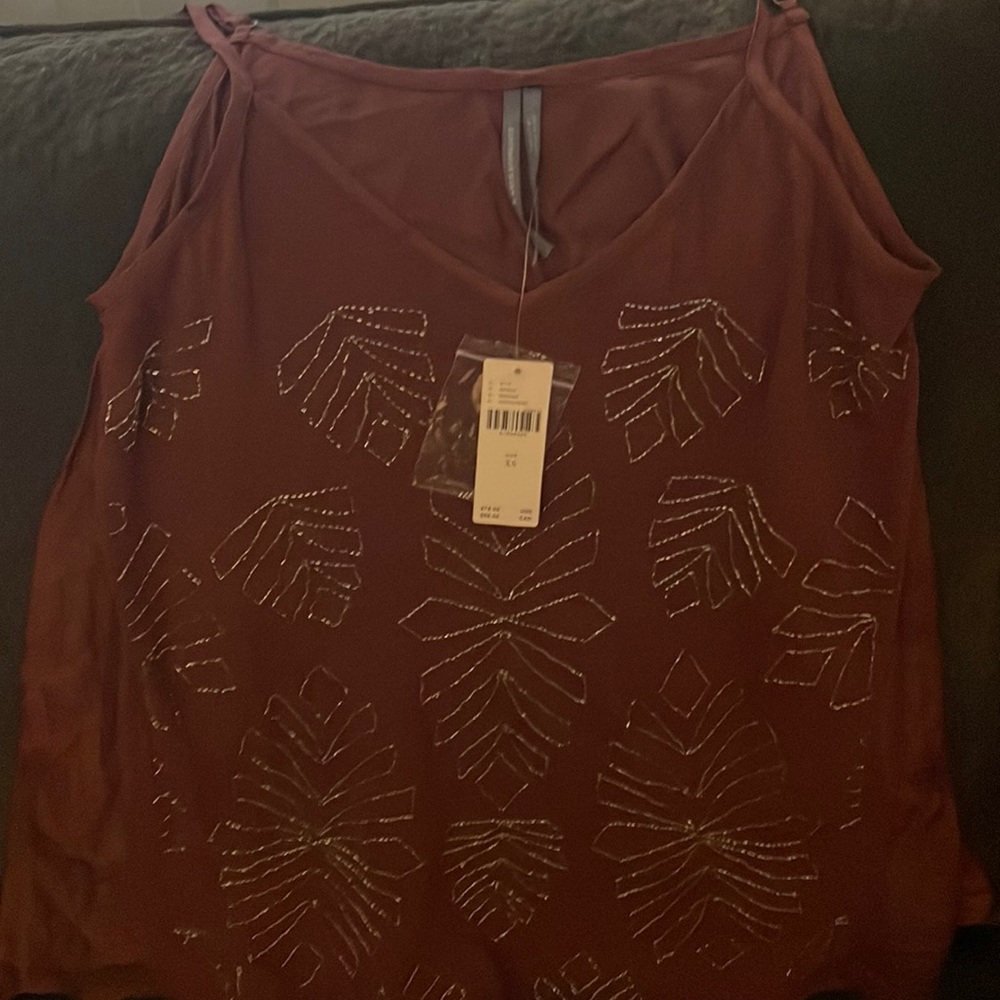 Swing tank top